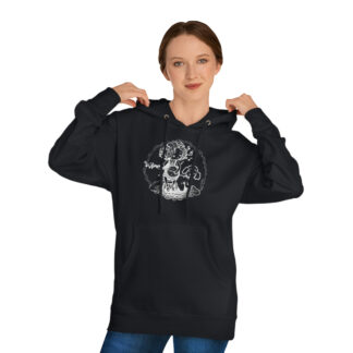 A woman wearing a banjo shirt/hoodie with a sketch of girl sitting on a chair playing the banjo for her white dog (maybe a bichon frise or a poodle). She is radiating musical notes and surrounded by a cloud-like frame.