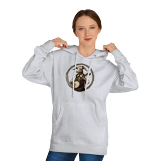 A woman wearing a banjo shirt/hoodie with an anthropomorphic, cheerful goat wearing a vest and tie while playing the banjo framed by a circular banjo head.